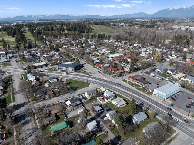 drone / aerial view featuring a mountain view and a residential view