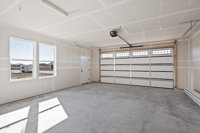 garage featuring a baseboard radiator and a garage door opener