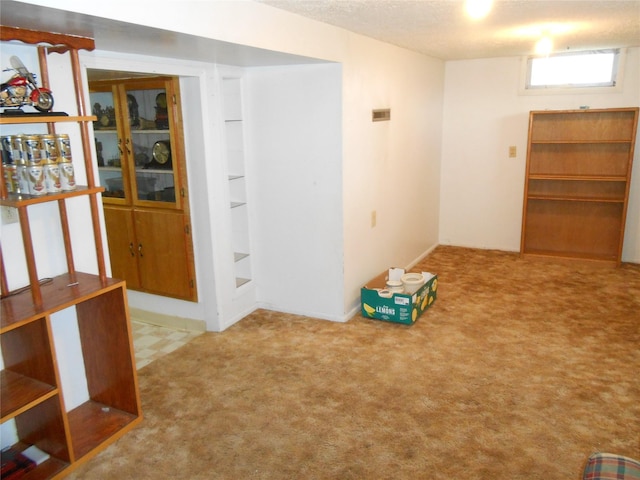 1426 2nd Ave NW, Great Falls, MT 59404 - carpeted empty room featuring built in shelves