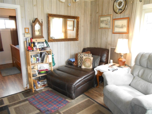1426 2nd Ave NW, Great Falls, MT 59404 - sitting room with wood walls, wood finished floors, and a wealth of natural light