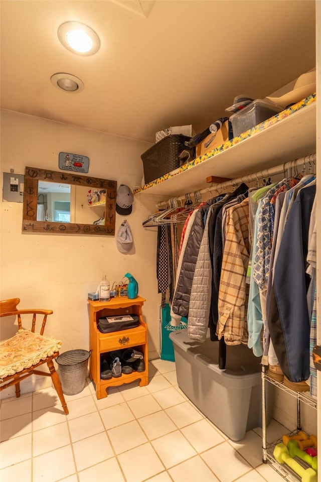 spacious closet featuring tile patterned flooring