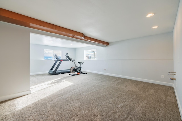 exercise room featuring carpet flooring, recessed lighting, and baseboards