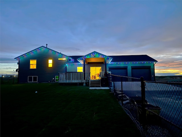 4645 Sea Ray Rd, Helena, MT 59602 - view of front of house with a garage and a wooden deck