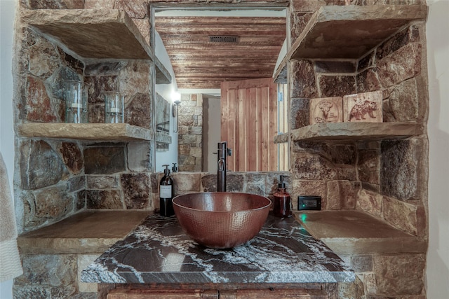 30 Bear Dance Vlg, Bigfork, MT 59911 - bathroom featuring wooden ceiling and a sink