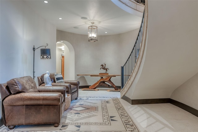 30 Bear Dance Vlg, Bigfork, MT 59911 - living area with arched walkways, recessed lighting, and a chandelier