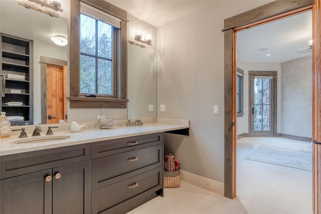 30 Bear Dance Vlg, Bigfork, MT 59911 - full bath featuring double vanity and baseboards