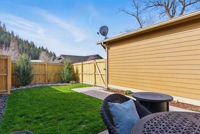 view of yard with a fenced backyard