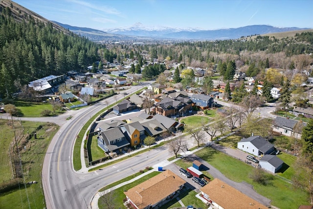 bird's eye view featuring a residential view, a forest view, and a mountain view