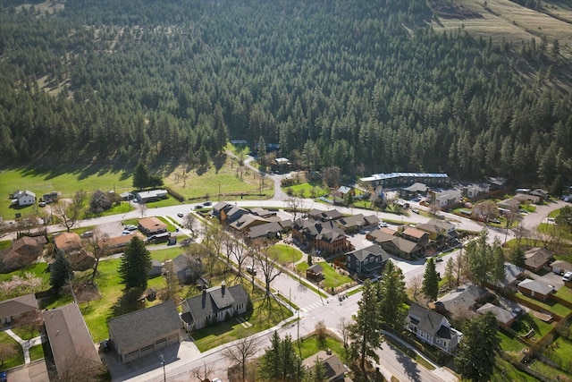 bird's eye view featuring a residential view and a view of trees