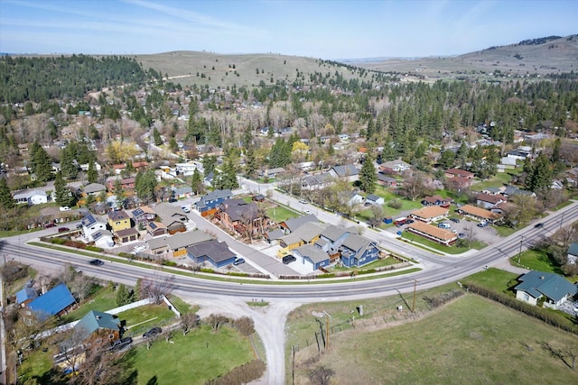 bird's eye view featuring a residential view and a mountain view