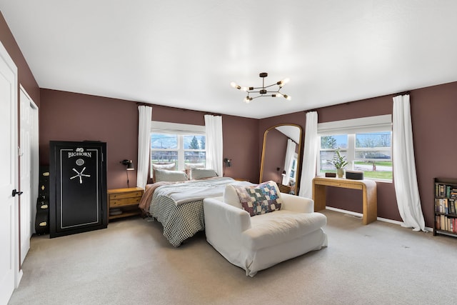 bedroom with arched walkways, light carpet, and multiple windows