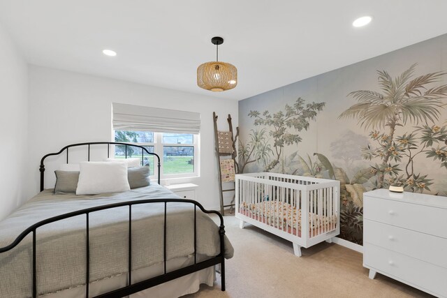 bedroom featuring light carpet and recessed lighting