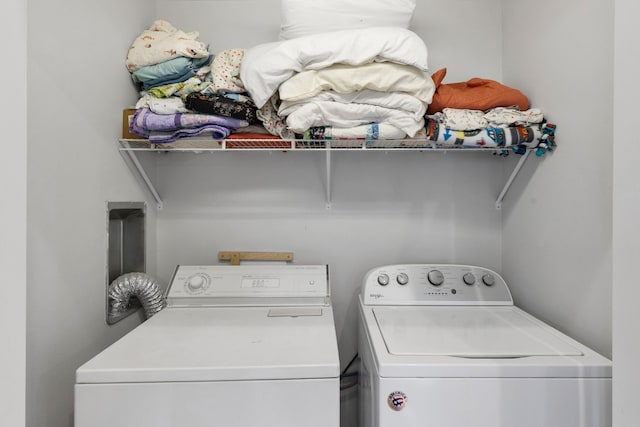 laundry room featuring laundry area and separate washer and dryer