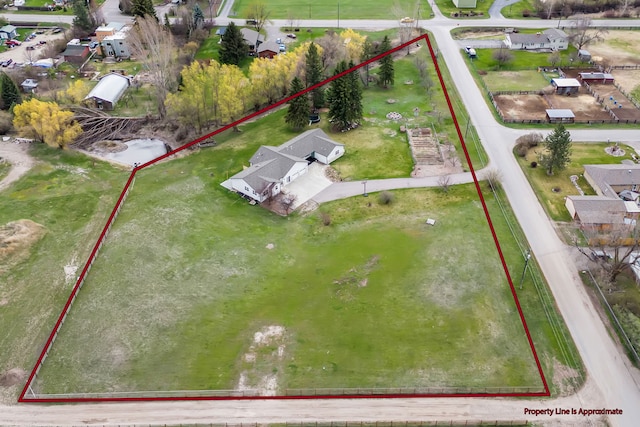 birds eye view of property with a residential view