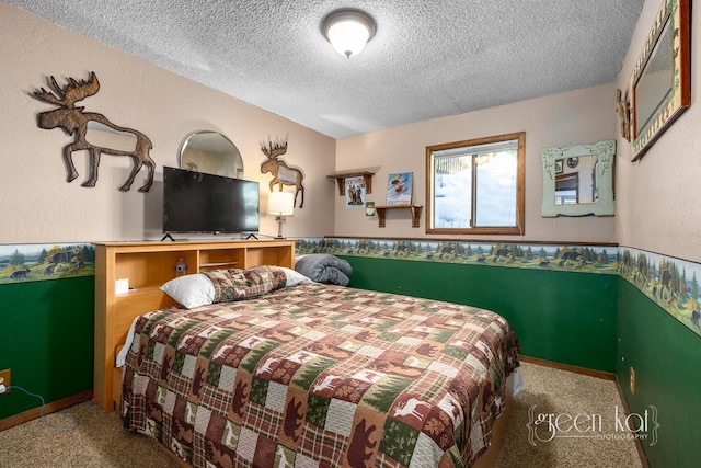 62 Limber Pne, Whitefish, MT 59937 - bedroom featuring a textured ceiling, carpet flooring, and wainscoting