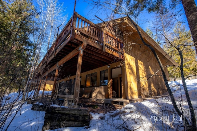 62 Limber Pne, Whitefish, MT 59937 - snow covered back of property with a wooden deck