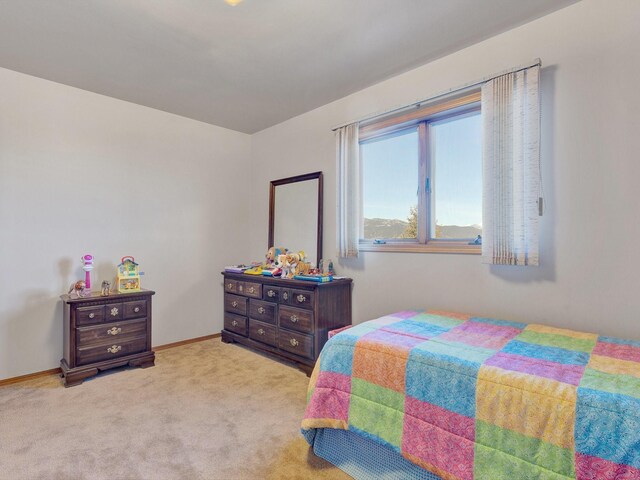 3600 Fairmont Rd, Anaconda, MT 59711 - carpeted bedroom featuring baseboards