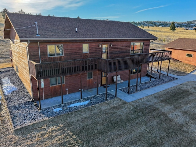 3600 Fairmont Rd, Anaconda, MT 59711 - rear view of property featuring a wooden deck, a patio area, and a shingled roof