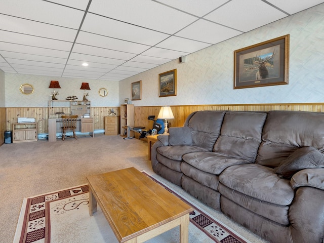 3600 Fairmont Rd, Anaconda, MT 59711 - carpeted living room featuring wallpapered walls, a drop ceiling, wood walls, and wainscoting