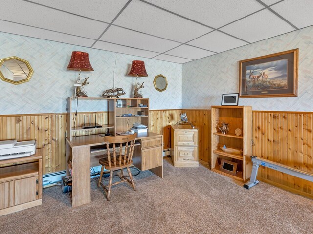 3600 Fairmont Rd, Anaconda, MT 59711 - carpeted home office featuring wallpapered walls, wainscoting, a baseboard heating unit, wooden walls, and a drop ceiling