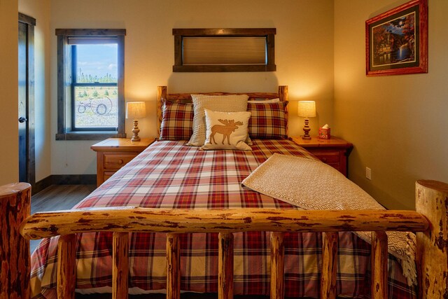 2360 Mt Highway 206, Columbia Falls, MT 59912 - bedroom featuring wood finished floors and baseboards