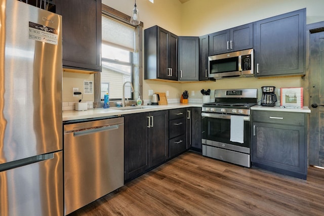 2360 Mt Highway 206, Columbia Falls, MT 59912 - kitchen featuring stainless steel appliances, light countertops, and dark wood-type flooring