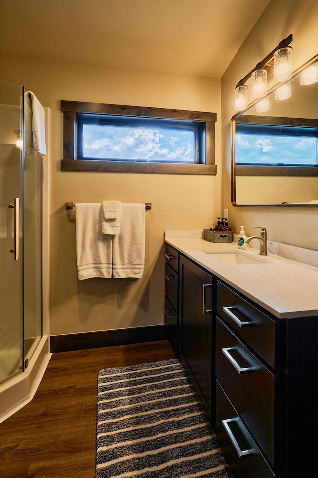 2360 Mt Highway 206, Columbia Falls, MT 59912 - bathroom with wood finished floors, vanity, and a shower stall
