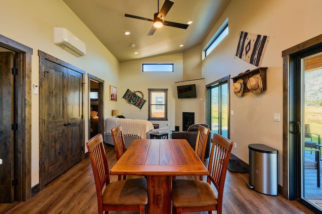 2360 Mt Highway 206, Columbia Falls, MT 59912 - dining area with an AC wall unit, wood finished floors, recessed lighting, a ceiling fan, and high vaulted ceiling
