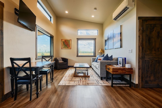 2360 Mt Highway 206, Columbia Falls, MT 59912 - living room featuring a wall mounted air conditioner, wood finished floors, recessed lighting, and vaulted ceiling