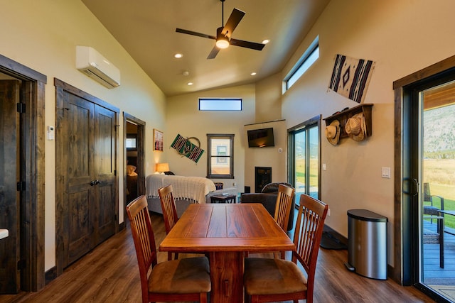 2360 Mt Highway 206, Columbia Falls, MT 59912 - dining room featuring a wall mounted AC, dark wood finished floors, ceiling fan, recessed lighting, and high vaulted ceiling