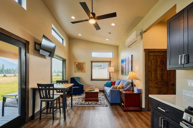 2360 Mt Highway 206, Columbia Falls, MT 59912 - living room with a wall mounted AC, a ceiling fan, dark wood-type flooring, recessed lighting, and lofted ceiling