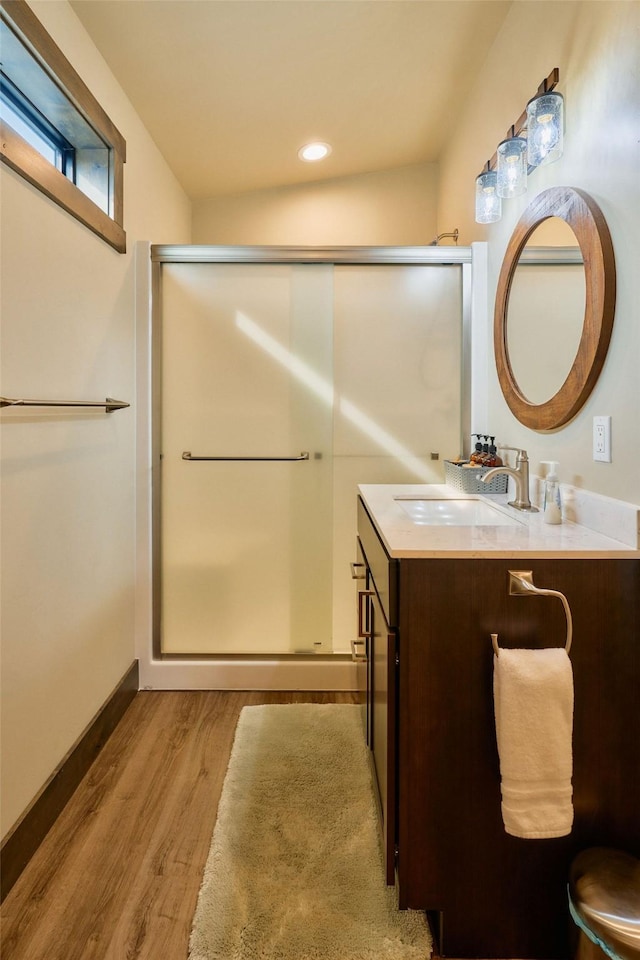 2360 Mt Highway 206, Columbia Falls, MT 59912 - full bath with vanity, wood finished floors, a stall shower, and recessed lighting