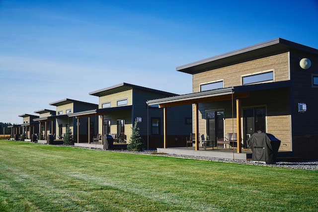 2360 Mt Highway 206, Columbia Falls, MT 59912 - back of property featuring a lawn