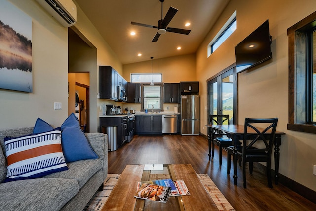 2360 Mt Highway 206, Columbia Falls, MT 59912 - living room featuring a wall mounted air conditioner, a ceiling fan, dark wood finished floors, recessed lighting, and high vaulted ceiling