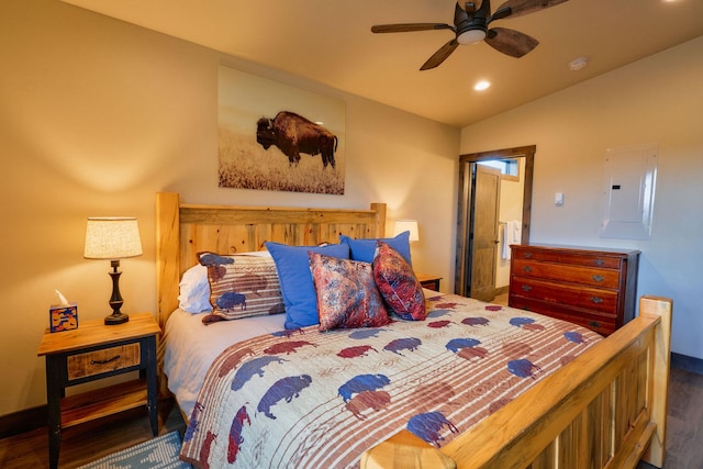2360 Mt Highway 206, Columbia Falls, MT 59912 - bedroom with wood finished floors, electric panel, vaulted ceiling, recessed lighting, and ceiling fan