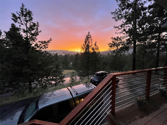 deck featuring a forest view