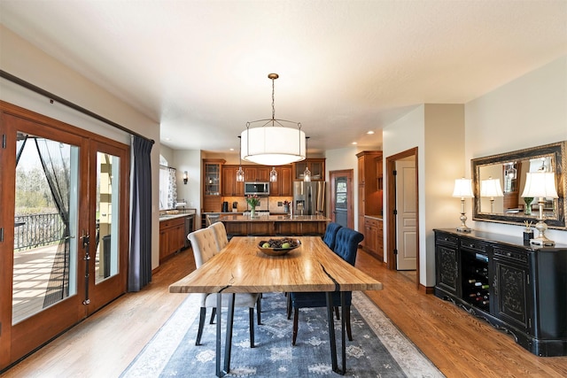 2200 Rafferty Ln, Missoula, MT 59804 - dining space with light wood-style flooring, french doors, and recessed lighting