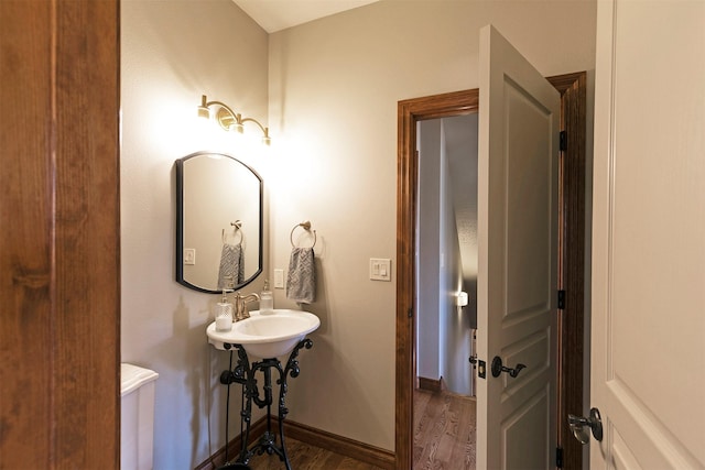 2200 Rafferty Ln, Missoula, MT 59804 - bathroom featuring wood finished floors and baseboards