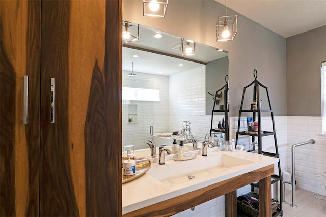 2200 Rafferty Ln, Missoula, MT 59804 - bathroom with a shower stall, tile walls, wood finished floors, and a bath
