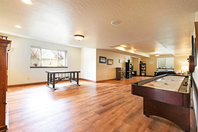 2200 Rafferty Ln, Missoula, MT 59804 - recreation room with a textured ceiling, wood finished floors, and recessed lighting