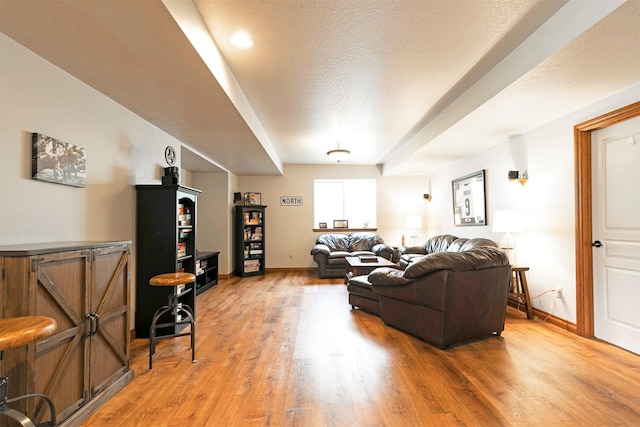 2200 Rafferty Ln, Missoula, MT 59804 - living room featuring light wood finished floors and a textured ceiling