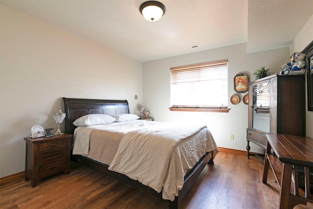 2200 Rafferty Ln, Missoula, MT 59804 - bedroom with baseboards and wood finished floors