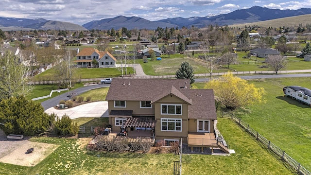 2200 Rafferty Ln, Missoula, MT 59804 - aerial perspective of suburban area featuring a mountainous background