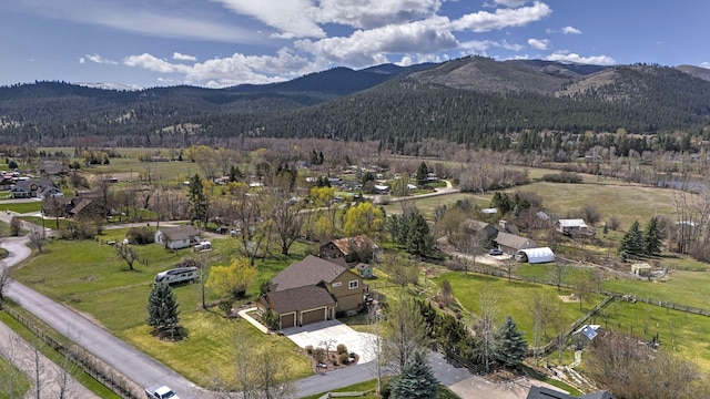 2200 Rafferty Ln, Missoula, MT 59804 - view of property location with a mountain backdrop and a heavily wooded area