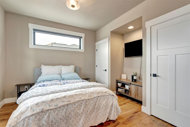 7038 Max Dr, Missoula, MT 59803 - bedroom featuring light wood-style flooring and baseboards