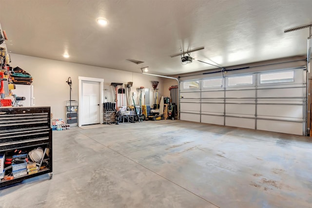 7038 Max Dr, Missoula, MT 59803 - garage featuring a garage door opener