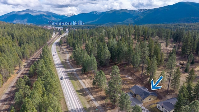 2419 Cornerstone Rd, Thompson Falls, MT 59873 - aerial view with a view of trees and a mountain view