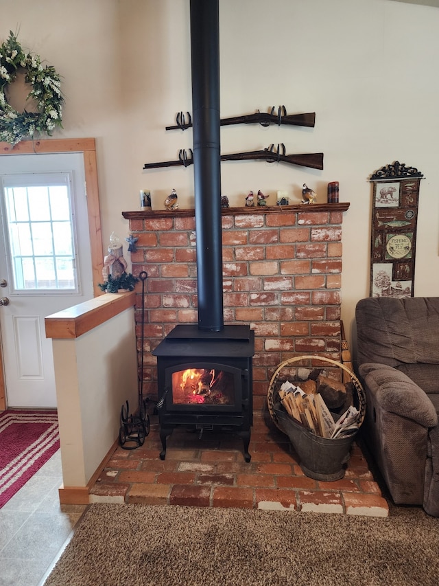 living room with a wood stove