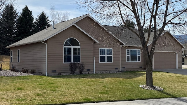 5055 Jordan Ct, Missoula, MT 59803 - view of front of house featuring crawl space, a garage, concrete driveway, and a front yard