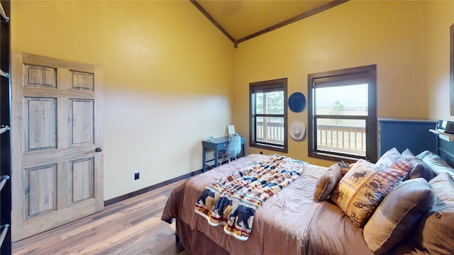 87 Velvet Grv, Eureka, MT 59917 - bedroom with vaulted ceiling, crown molding, and wood finished floors
